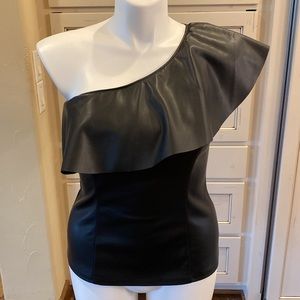 One shoulder ruffled “pleather” fabric top.